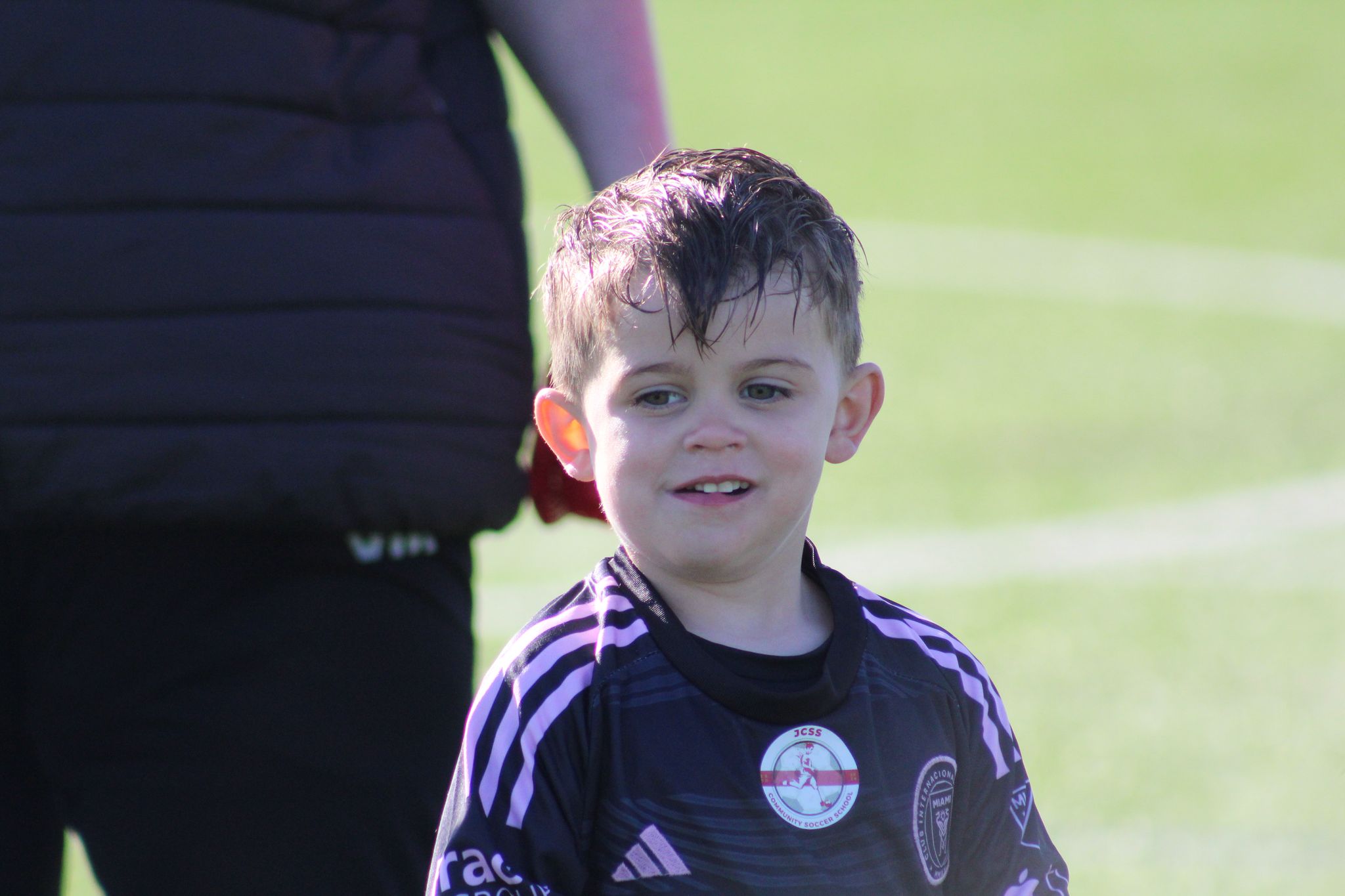 playmakers football session in skegness - young child listening to instructions
