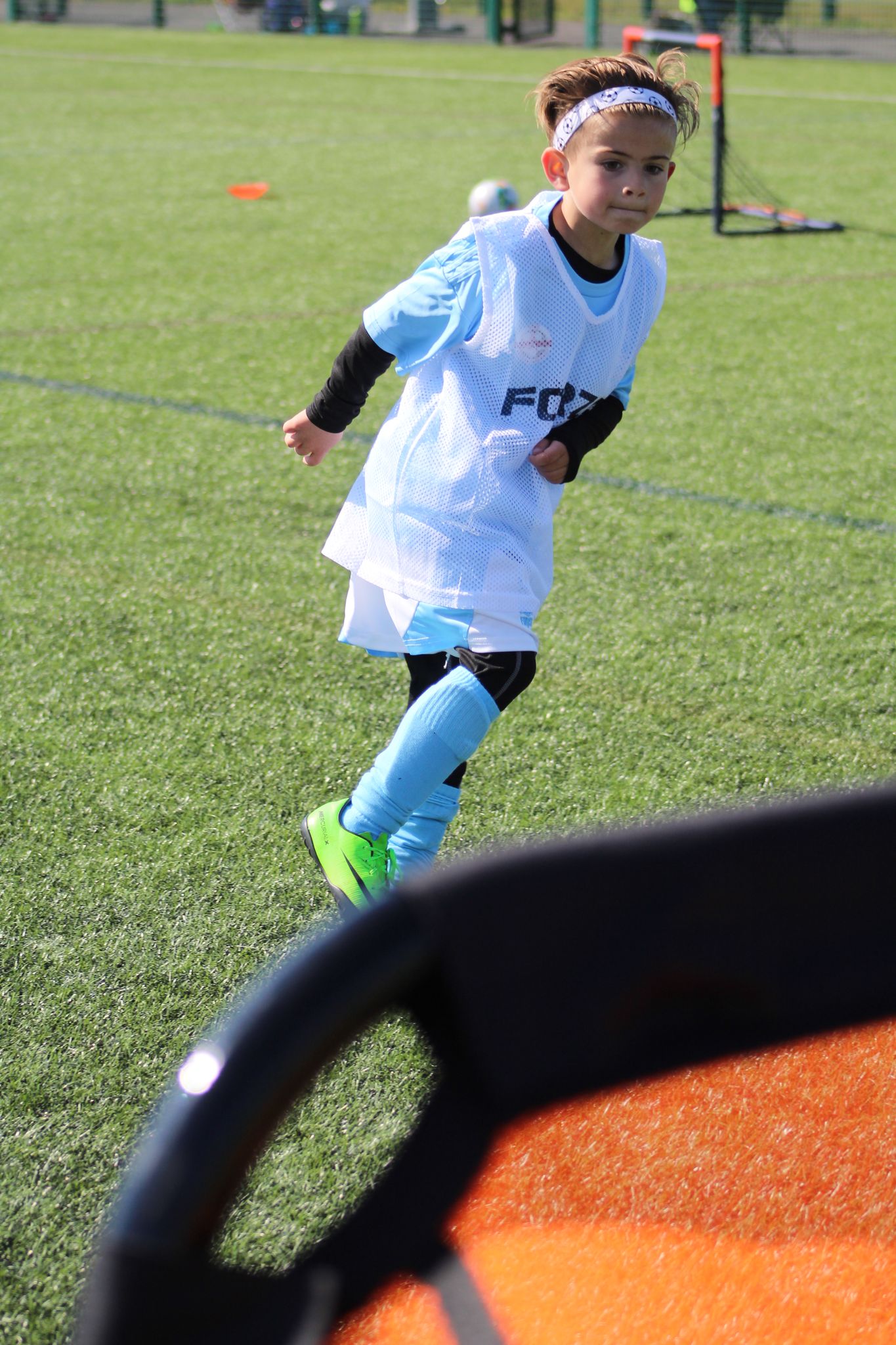 child scoring a goal in a football holiday camp in skegness