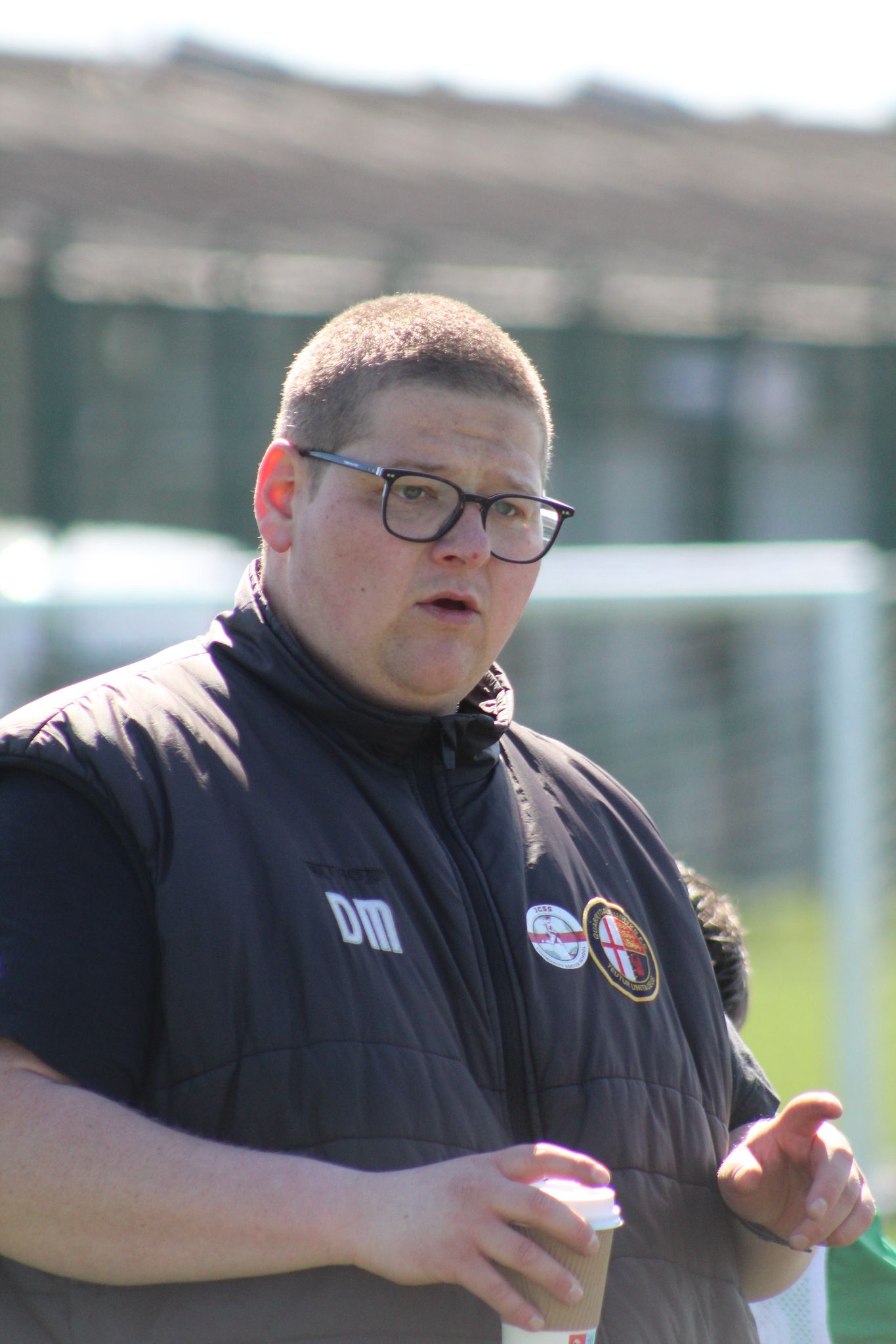 Another JCSS coach instructing a young player during football coaching session in Skegness