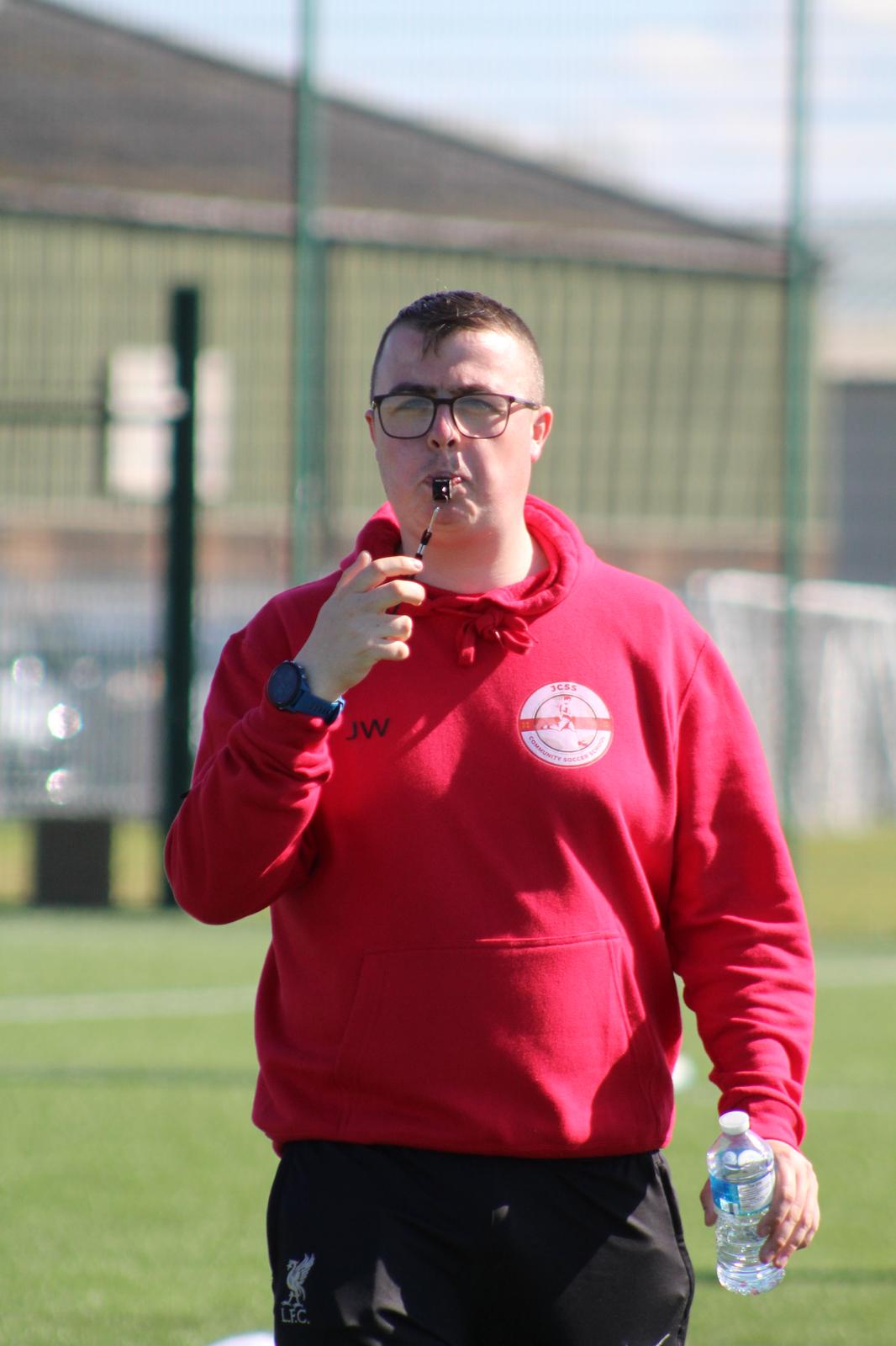 main coach jack reffing a football match in one of the football holiday camps in skegness