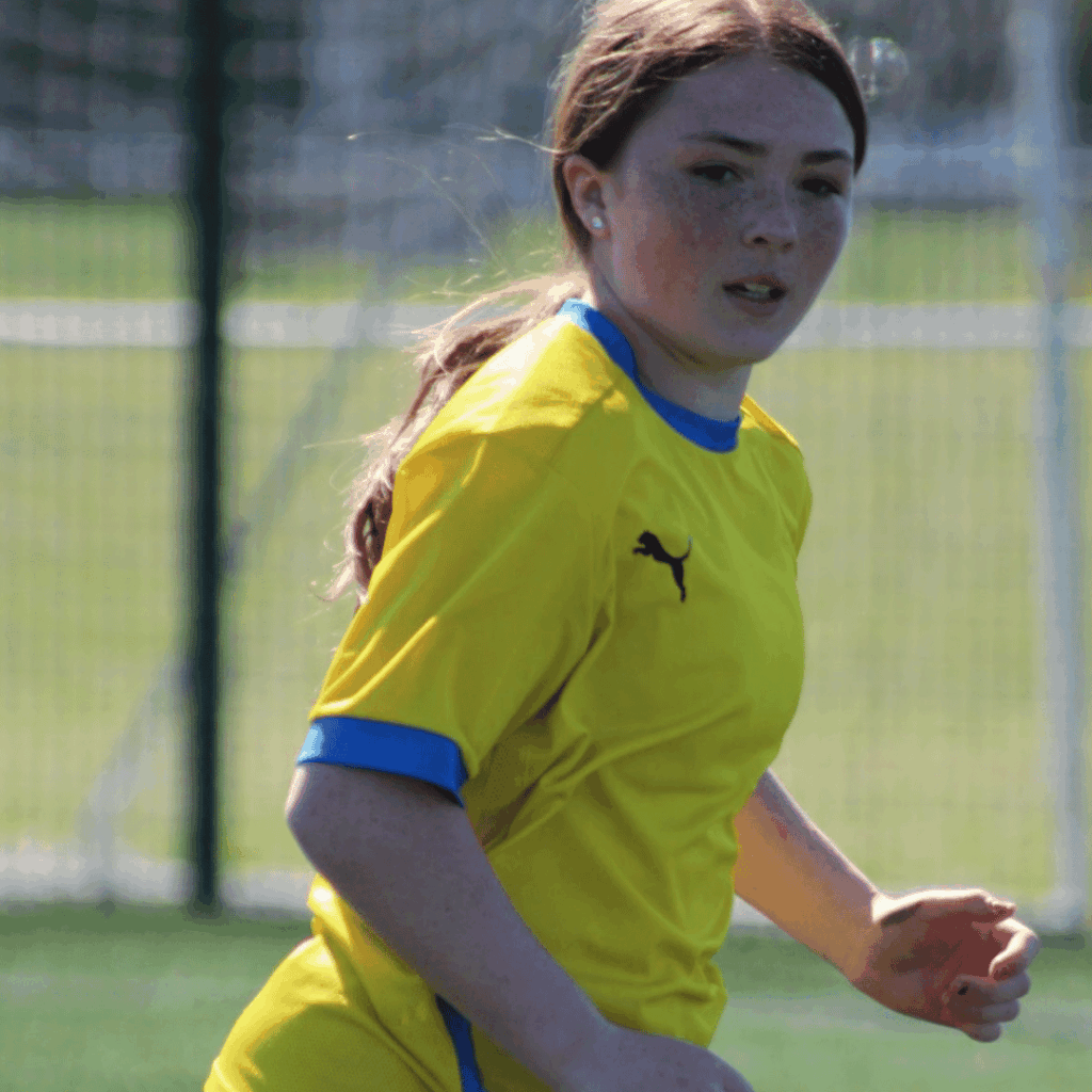 girl running for the ball in jcss development in skegness