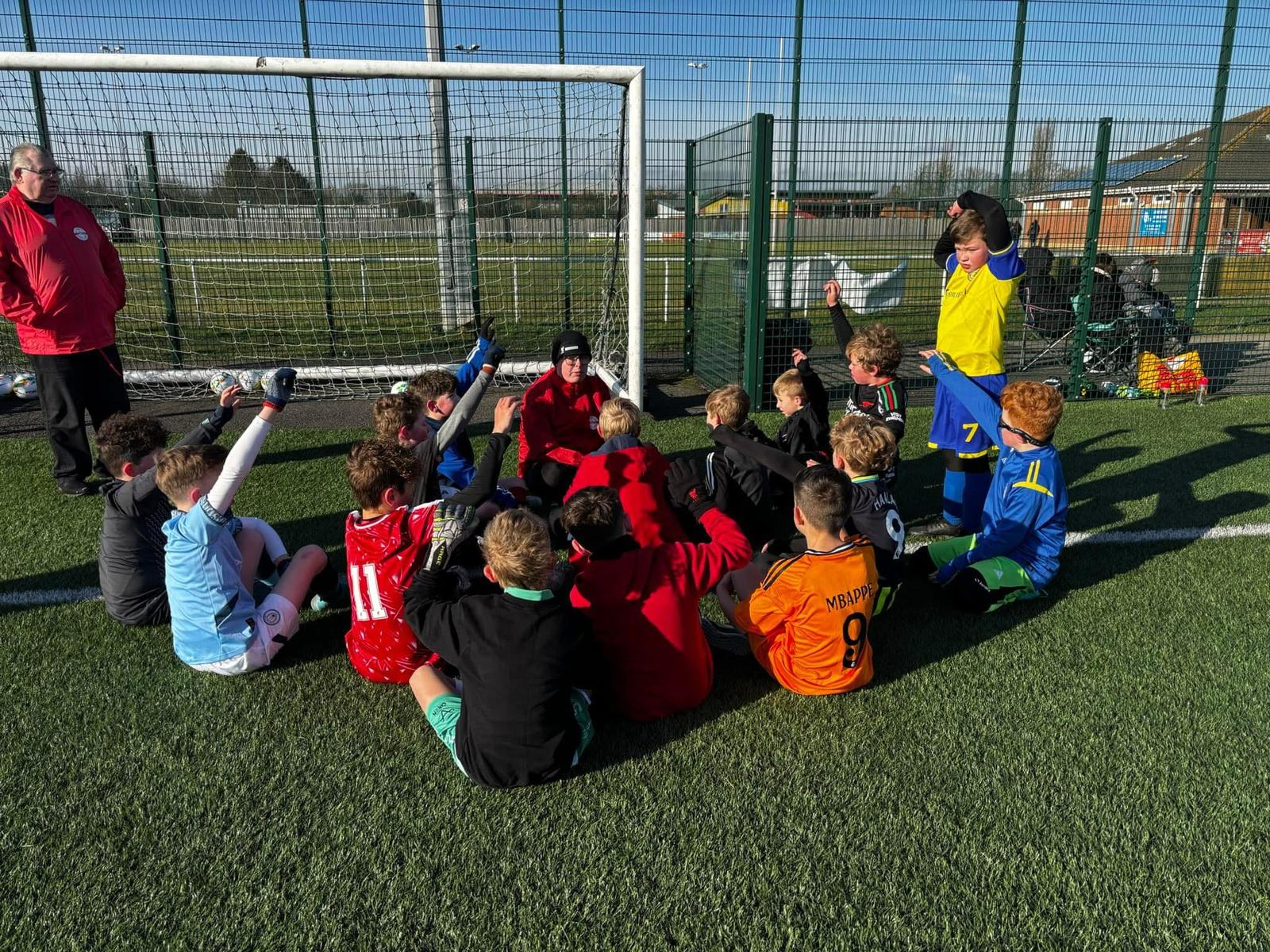 Jack coaching a large group of young players at JCSS, Skegness